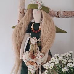 anioł stróż w butelkowej zieleni