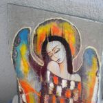 Zamyślony anioł - deska - zblizenie