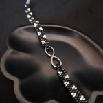 Bransoletka z Symbolem Nieskończoności - czarno-srebrna bransoletka