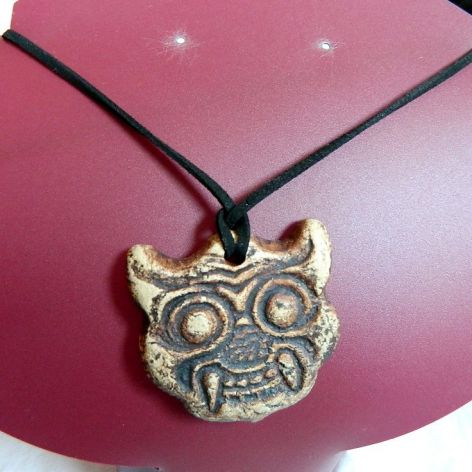 Tybetańska maska, talizman, wisior na rzemieniu