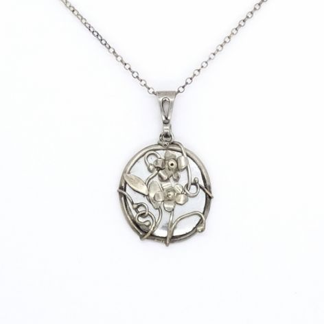 Srebrny naszyjnik medalion z kwiatami