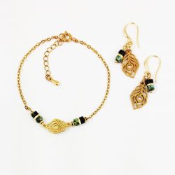 Komplet z pawim piórkiem.