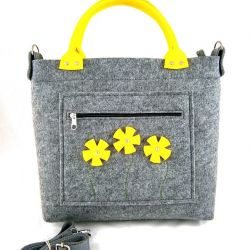 Yellow flowers in pocket/strap