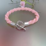 Bransoletka Z Różowych Koralików Sznur Z Serduszkiem 25.17 - 