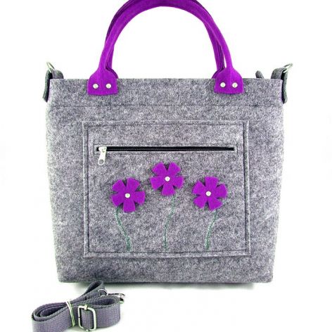 Purple flowers in pocket/strap