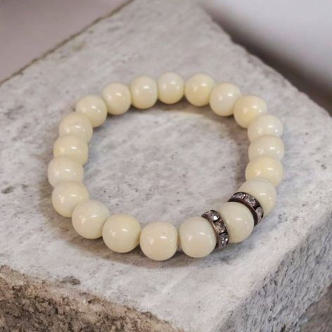 Bransoletka na gumce ecru.