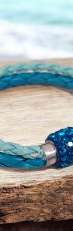 Bransoletka rzemykowa niebieskie cyrkonie.