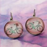 Kolczyki wiszące z rowerem w różu - 