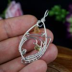 Cytryn Srebrny wisior z cytrynem, peridotem - srebrny wisior na dłoni