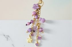 Fioletowo złoty breloczek z kwiatkiem