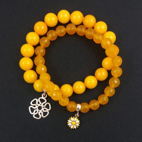 Bransoletki srebrne z kwiatkami.