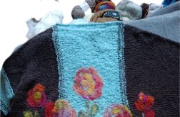 Kremowy sweter w pasy
