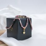 Naszyjnik "Celestial Compass" - Gwiazda Wewnętrznego Spokoju - z Rodonitem - 