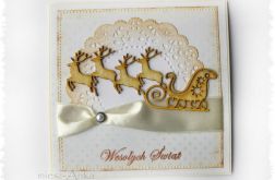 Kartka świąteczna z saniami i reniferami