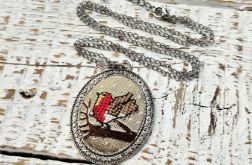 medalion z zimowym ptaszkiem