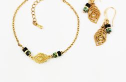 Komplet z pawim piórkiem.