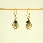 Komplet z pawim piórkiem. - Komplet z pawim piórkiem.