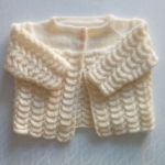 Sweterek kremowy - płaszczyk
