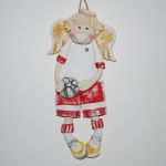 Piłkarz Jurek gra w obronie - aniołek z dedykacją - 
