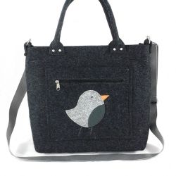 Gray bird on pocket/strap