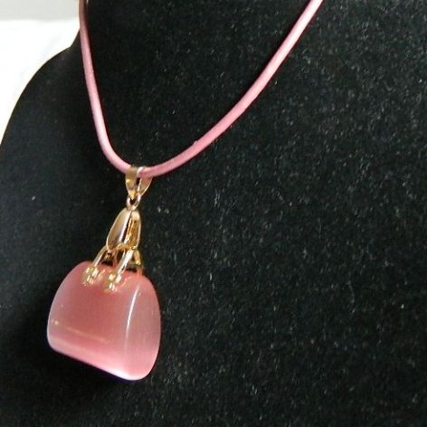 Różowy kwarc "kocie oko" - wisiorek torebka na rzemyku