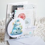Kartka ślubna - Serdeczne życzenia w dniu ślubu nr 2 - Seria * Koziołkowe Love * to nasze produkty, które są z nami od zawsze. Najczęściej kupowane przez klientów. * * * Oto karteczka z pięknym tortem w dniu ślubu Wykonana metodą scrapbookingu z profesjonalnych materiałów W centrum jest także zegar i gałązki 