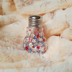 Kwiecista solniczka szklana wysokość 7 cm.