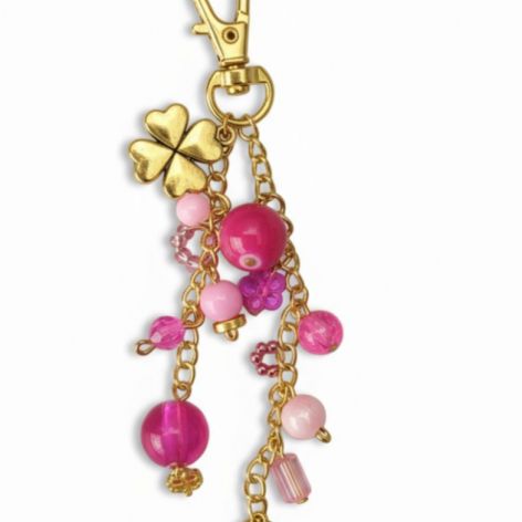 Złoto różowy breloczek z koniczynką