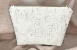 Kosmetyczka materiałowa solidna, stylowa ,praktyczna,jasnobeżowa.