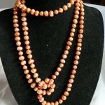 Pomarańczowe, naturalne perły, długi sznur pereł, naszynik - 