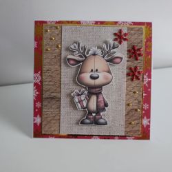 Kartka świąteczna Boże Narodzenie renifer z prezentem