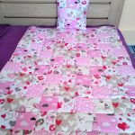 Komplet narzuta z poduszką różowa - dla dziewczynki