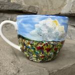 Ręcznie malowana porcelanowa filiżanka ze spodkiem Łąka i chmury - 