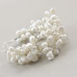 Perły w oplocie - bransoletka - 