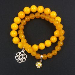 Bransoletki srebrne z kwiatkami.