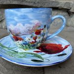 Ręcznie malowana porcelanowa filiżanka ze spodkiem Łąka i chmury - 