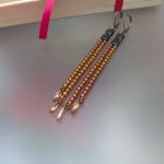 Kolczyki Czarno Złote Kostki Tila Czarne Długie - 