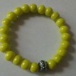 Bransoletka w kolorze limonkowym - bransoletka z koralikiem shamballa
