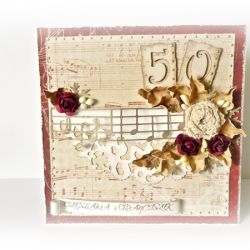 Kartka z okazji jubileuszu z szydełkowym kwiatkiem wzór