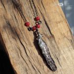 Małe piórko z marmurem - piórko w miedzi i cynie