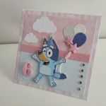 Kartka na urodziny Bluey z balonikami - Kartka na urodziny Bluey z balonikami